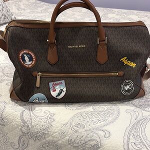 MICHAEL Michael Kors Brown Travel Bag with Leather Trim and Colorful Patches
